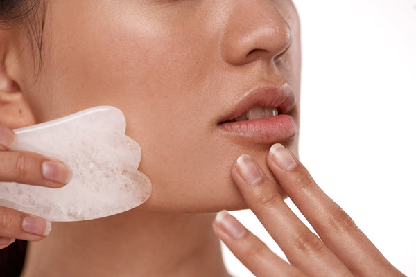 Outil de beauté Gua Sha en quartz rose